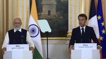 PM Modi and French President Emmanuel Macron at the joint press meeting in Paris ahead of bilateral discussions.