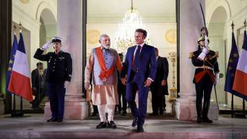 PM Modi with President of France Emmanuel Macron at Elysee Palace after he was conferred with the Grand Cross of the Legion of Honour, Frances highest civilian and military honour, in Paris.