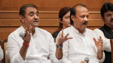 Maharashtra Deputy Chief Minister Ajit Pawar with Praful Patel and others during a press conference, in Mumbai.