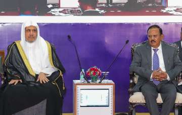Muslim World League chief Mohammed bin Abdulkarim Al-Issa with National Security Advisor Ajit Doval.