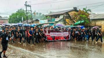 Members of Indigenous Tribal Leaders’ Forum (ITLF) take part in a protest rally