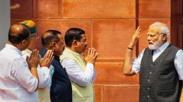 Prime Minister Narendra Modi while interacting with ministers outside Parliament.