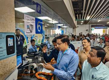 Noida Metro Rail Corporation (NMRC) Managing Director Lokesh M. after the launch of Unified Payments Interface (UPI) payment option at its ticket/customer care counters, at a metro station in Noida