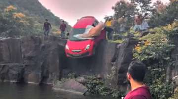 A car falls into the waterfall in Madhya Pradesh's Indore. 