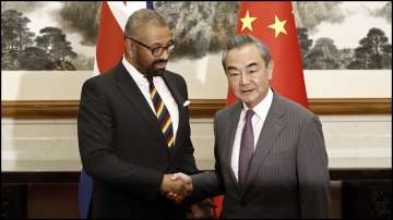 British Foreign Secretary James Cleverly with his Chinese counterpart Wang Yi