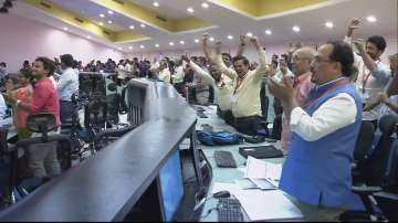 Scientists celebrate at the control room of ISRO headquarters after ISROs third lunar mission Chandrayaan-3s Lander Module (LM), comprising the lander (Vikram) and the rover (Pragyan), successfully touches down on the Moon’s surface.