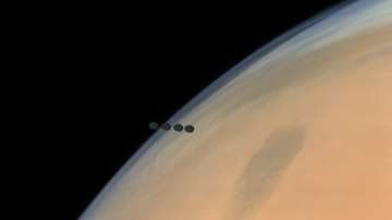 Phobos, the moon featured in the video, orbits the Red Planet once every 7 hours and 39 minutes, at a distance of just 5,989 km above the planet's surface.