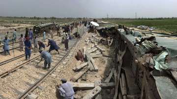 Restoration efforts at the railway track where the Hazara Express train derailed on Sunday