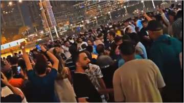 Hundreds of Pakistanis near the Burj Khalifa in Dubai, UAE