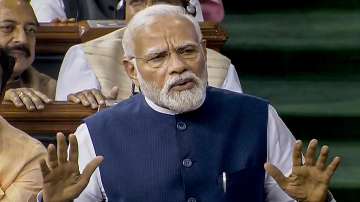 Prime Minister Narendra Modi replies on the Motion of No-Confidence in the Lok Sabha in the Monsoon session of Parliament, in New Delhi