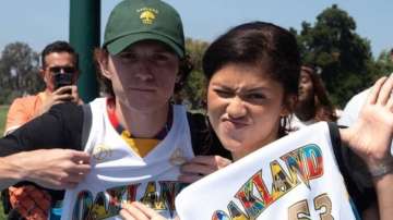 Tom Holland and Zendaya pose together at the event.