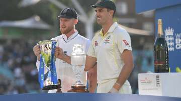 Ben Stokes and Pat Cummins pose with the Ashes 