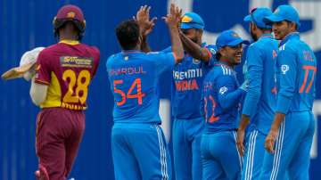 Indian players celebrate a wicket during 3rd ODI vs the West Indies in Trinidad