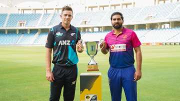 Tim Southee and Muhammad Waseem with T20I series trophy