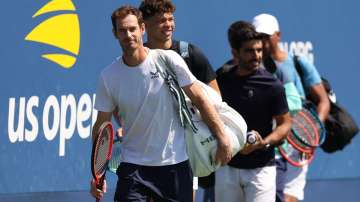 Andy Murray and others make their way on to the court in US Open