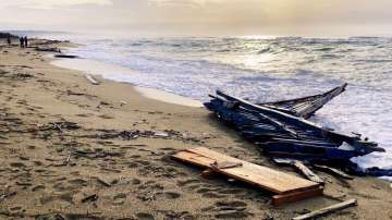 Part of the wreckage of a capsized boat that was washed ashore at a beach near Cutro, southern Italy, on Feb. 27, 2023.