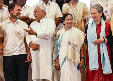 Congress leader Rahul Gandhi interacts with Bihar CM Nitish Kumar as West Bengal CM and TMC supremo Mamata Banerjee amd Congress leader Sonia Gandhi look on ahead of the meeting of Indian National Developmental Inclusive Alliance (I.N.D.I.A) leaders