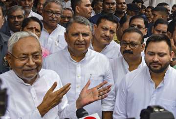 Bihar Chief Minister Nitish Kumar with Deputy Chief Minister Tejashwi Yadav during celebrations of the birth anniversary of Bharatiya Jana Sangh leader Deendayal Upadhyaya