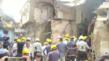 Portions of 4-storey residential building collapse in Girgaon, none hurt.