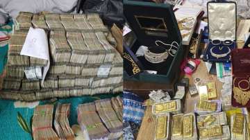 During the raid Rs 18 lakh, gold and jewelry worth approximately Rs 13 crore gold bars were also seized.