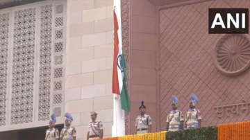 Vice President Jagdeep Dhankhar hoists the national flag at Gaj Dwar of the New Building of Parliament.