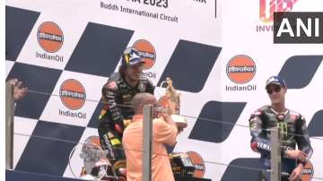 Yogi Adityanath presents trophy to winner of MotoGP Grand Prix event