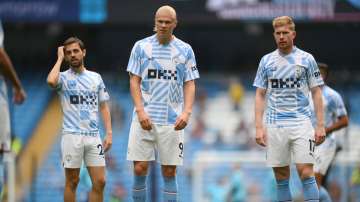 Manchester City player Bernardo Silva, Erling Haaland and Kevin De Bruyne during an EPL match in August 2022