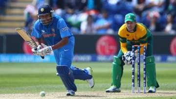 Rohit Sharma and AB de Villiers during ICC Champions Trophy match in 2013