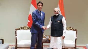 Canadian PM Justin Trudeau (right) with Indian counterpart Narendra Modi (right) 