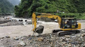Madhya Pradesh rains, Madhya Pradesh rain news,  Ex minister son rescued, swollen river  choral, Mad