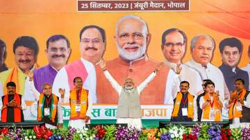 PM Modi waves at supporters during the Karyakarta Mahakumbh, in Bhopal. Union Ministers Jyotiraditya Scindia and Narendra Singh Tomar, Madhya Pradesh Chief Minister Shivraj Singh Chouhan and State BJP President VD Sharma are also seen. (Representational image)