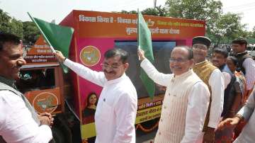 Madhya Pradesh Chief Minister Shivraj Singh Chouhan with MP BJP President VD Sharma flags off the Vikas Rath Yatra, in Bhopal (Representational image)