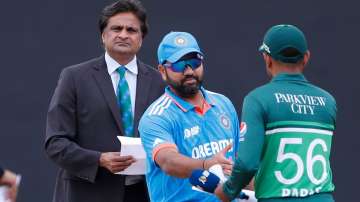 Rohit Sharma shakes hands with Babar Azam