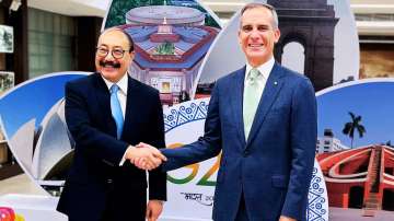 Harsh Vardhan Shringla, G20 chief coordinator, (L) along with US Ambassador to India Eric Garcetti (R).