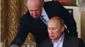 Russian President Vladimir Putin with Wagner's boss