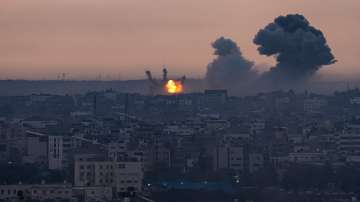 Smoke rises after Israeli air strike in Gaza Strip October 9