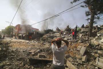 People in Gaza searching for their loved ones who are trapped inside the rubble following massive airstrikes by Israel.