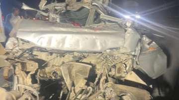 The mangled van on Greater Noida Yamuna Expressway