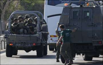 Israeli forces in Ashkelon as Hamas launched a devastating rocket attack.