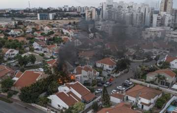 Smoke coming out of buildings in Israel after a devastating rocket attack by Hamas group.