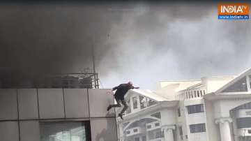 A man was seen jumping from the building to save his life in Bengaluru. 