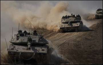 Israeli tanks approaching the Gaza border.