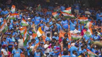 Fans cheer before the ICC Mens Cricket World Cup 2023 match between India and Pakistan, at Narendra Modi Stadium, in Ahmedabad.
