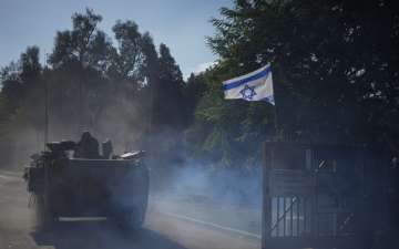 Israeli forces approach the Gaza border ahead of an imminent ground operation.