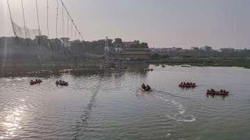 A file photo shows rescue operation after the collapse of a suspension bridge over the Machchhu river, in Morbi district in November 2022.