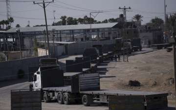 Palestinian trucks waiting for humanitarian aid in Gaza