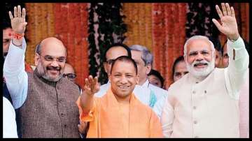 Prime Minister Narendra Modi with Home Minister Amit Shah and UP CM Yogi Adityanath