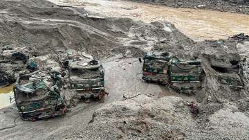 Indian Army vehicles which were swept away in flash floods