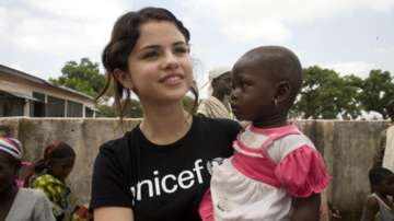 'My heart breaks to see all of the horror, hate, violence,' says Selena Gomez 