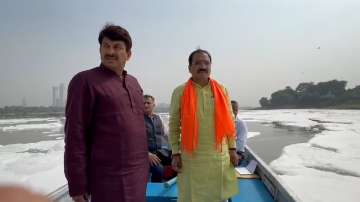 Delhi BJP president Virendra Sachdeva and party MP Manoj Tiwari 